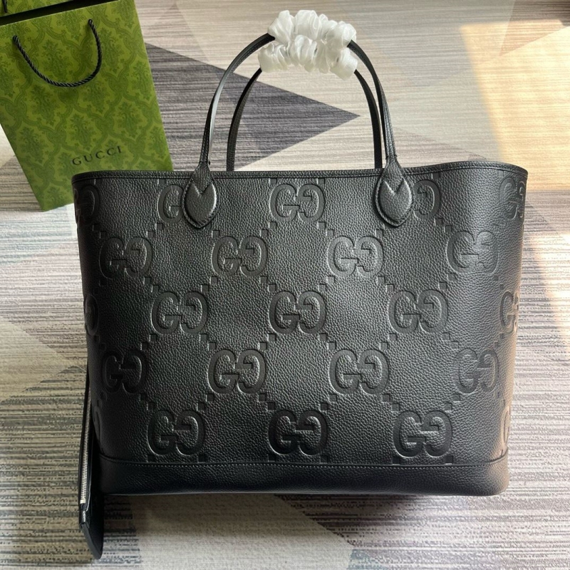 G*u*i shopping bags